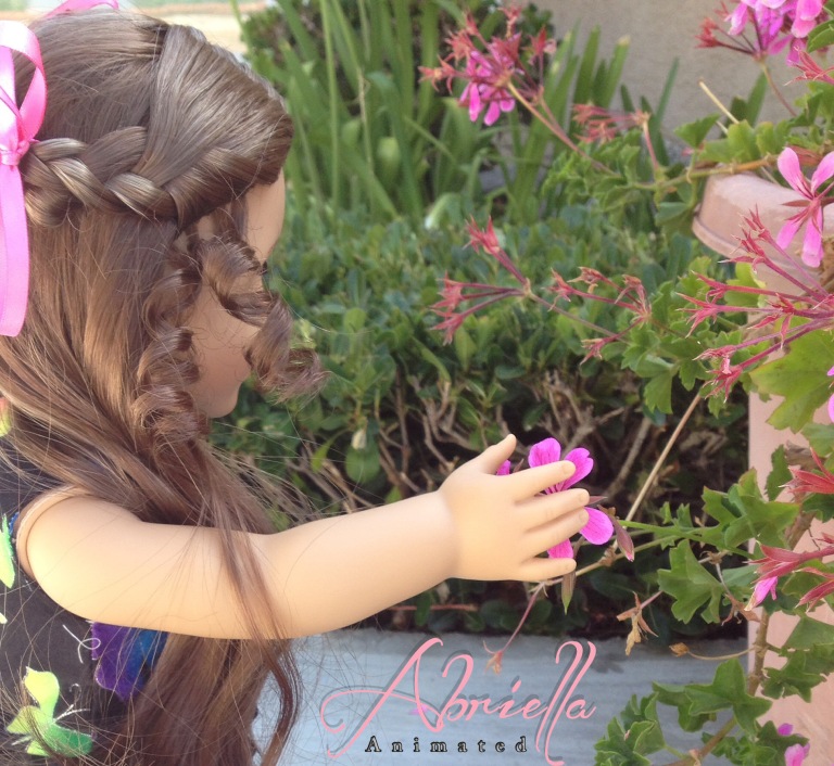 abriella picking flowers